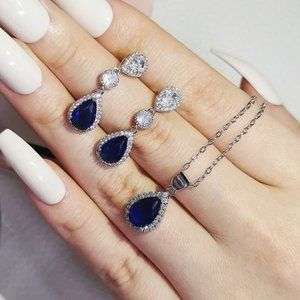 Sterling Silver (S925) Blue & Clear Gems on a Silver Necklace & Earrings…